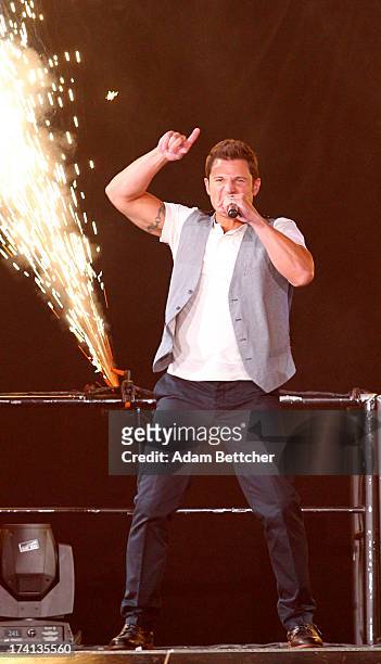 Degrees singer Nick Lachey performs during "The Package Tour" at Target Center on July 20, 2013 in Minneapolis, Minnesota.