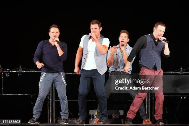 Degrees Drew Lachey, Nick Lachey, Justin Jeffre and Jeff Timmons perform during "The Package Tour" with Boyz II Men and New Kids On The Block at...