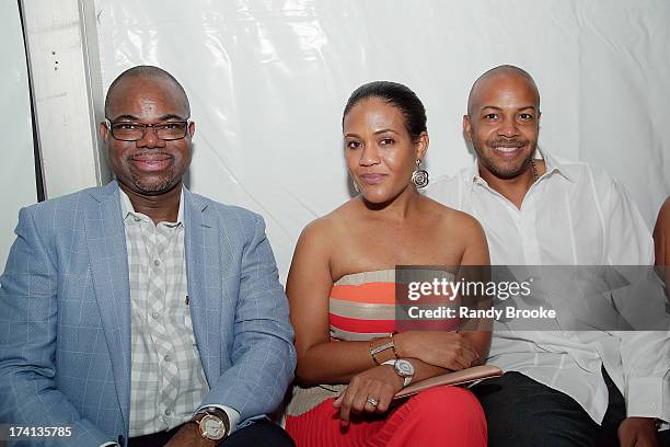 Reel Code Founder Isaac Daniel with his CEO Alexia Jones and guest at the CM Cia. Maritima show at Mercedes-Benz Fashion Week Swim 2014 at Raleigh...