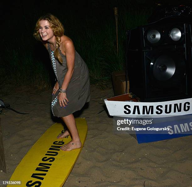 Host Lenay Dunn gets her boogy on as DJ Ladyhawke spins the night away at Samsung's #GigaSoundBlast Summer DJ Series on July 20, 2013 at Surf Lodge...