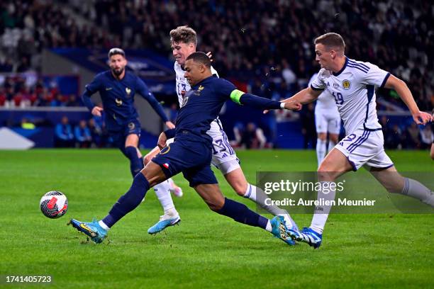 Kylian Mbappe of France runs with ball during the international friendly match between France and Scotland at Decathlon Arena on October 17, 2023 in...