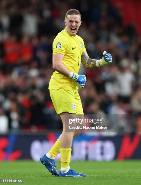 Jordan Pickford of England celebrates towards the fans after the team's victory during the UEFA EURO 2024 European qualifier match between England...