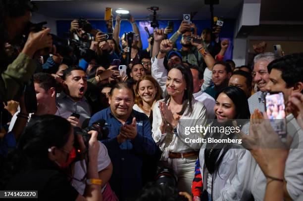 Maria Corina Machado, banned opposition presidential primary candidate for the Vente Venezuela party, celebrates during an election night rally in...