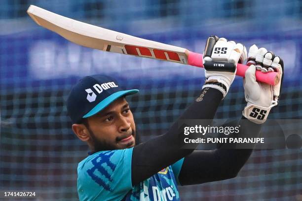 Bangladesh's Mushfiqur Rahim bats in the nets during a practice session on the eve of their 2023 ICC Men's Cricket World Cup one-day international...