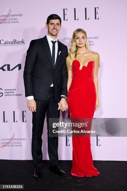 Thibaut Courtois and Mishel Gerzig attend the "ELLE Cancer Ball" photocall at the Royal Theater on October 17, 2023 in Madrid, Spain.