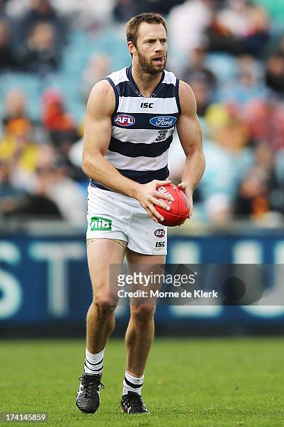 Joel Corey of the Cats prepares to kick the ball during the round 17 AFL match between the Adelaide Crows and the Geelong Cats at AAMI Stadium on...