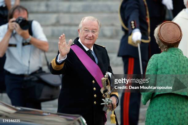 Queen Paola and King Albert II of Belgium are seen in front of the Cathedral of St Michael and Saint Gudula prior to the Abdication Of King Albert II...