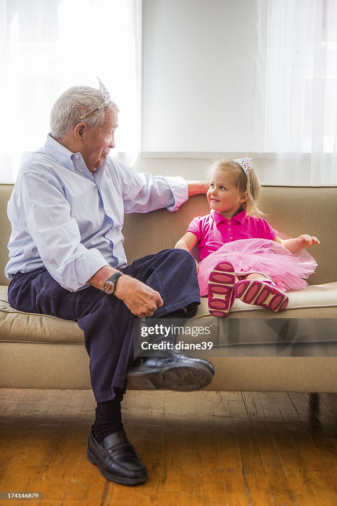 Grandfather and grandaughter playing Princess