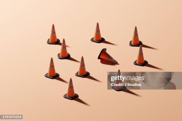 singled out traffic cones - regeln stock-fotos und bilder