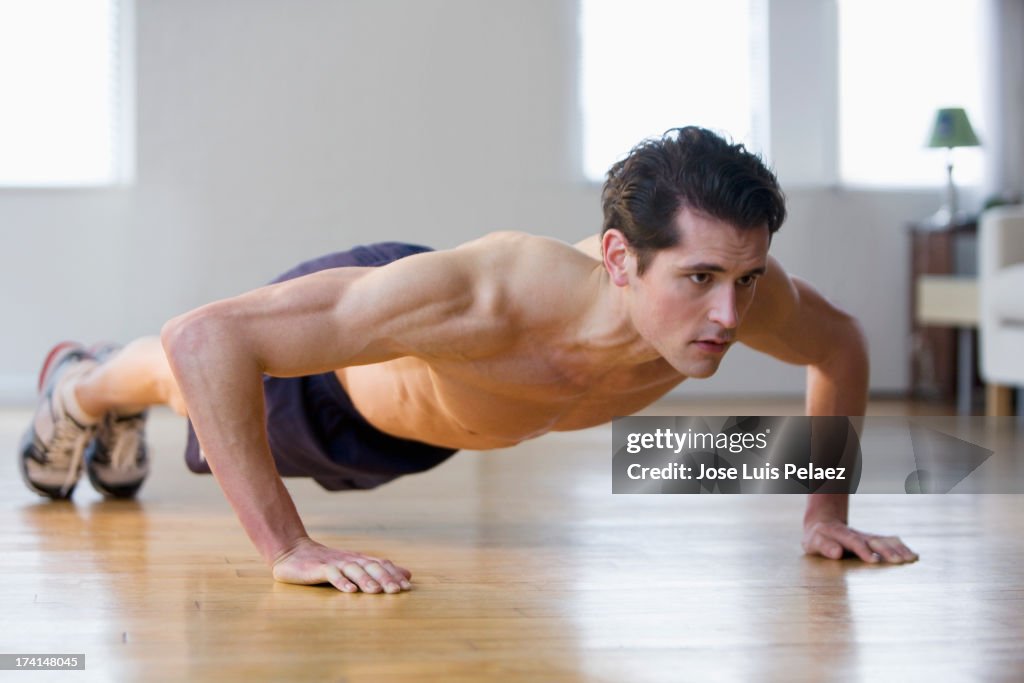 Man exercising at home