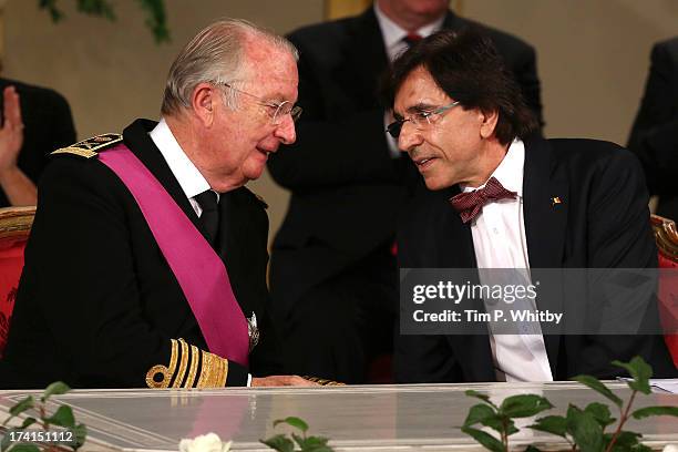 King Albert II of Belgium and Elio Di Rupo talk at the Abdication Ceremony Of King Albert II Of Belgium, & Inauguration Of King Philippe at the Royal...