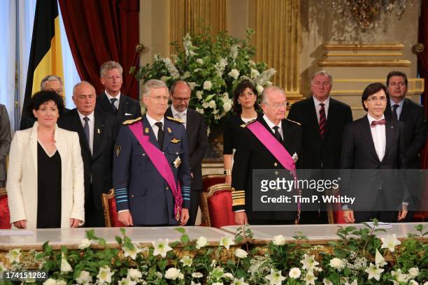 Annemie Turtelboom, Prince Philippe of Belgium, King Albert II of Belgium and Elio Di Rupo pose at the Abdication Ceremony Of King Albert II Of...