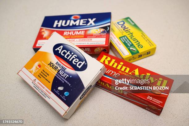 This picture taken on October 23, 2023 shows different cold medication boxes in a pharmacy in Riedisheim, eastern France. Health authorities warn...