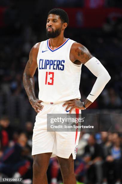 Los Angeles Clippers Guard Paul George looks on during a NBA exhibition game between the Denver Nuggets and the Los Angeles Clippers on October 17,...