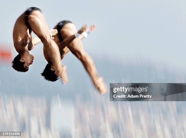 Yuan Cao and Yanguan Zhang of China competes in the Men's 10m Platform Synchronised Diving preliminary round on day two of the 15th FINA World...