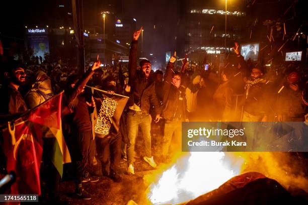 Protesters demonstrate in front of the Israeli consulate after an explosion at hospital in Gaza killed hundreds on October 17, 2023 in Istanbul,...