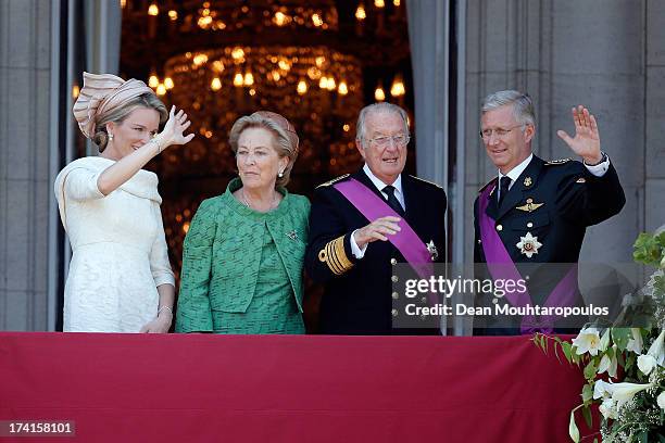 Queen Mathilde of Belgium, Princess Paola of Belgium, King Albert II of Belgium and King Philippe of Belgium are seen greeting the audience from the...