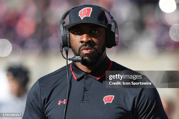 Wisconsin Badgers Defensive Line Coach Greg Scruggs looks on during the college football game between the Wisconsin Badgers and the Illinois Fighting...