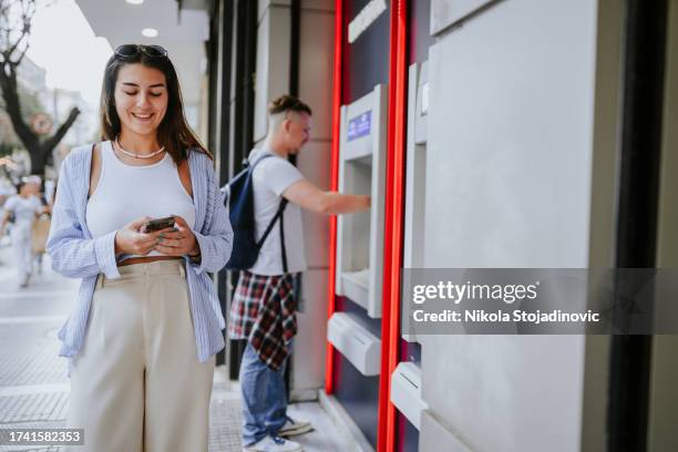 let's go shopping - man atm smile stock pictures, royalty-free photos & images