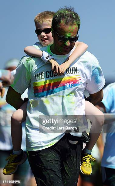 Competitors enjoy the Color Run on July 21, 2013 in Cologne, Germany.