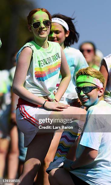 Competitors enjoy the Color Run on July 21, 2013 in Cologne, Germany.