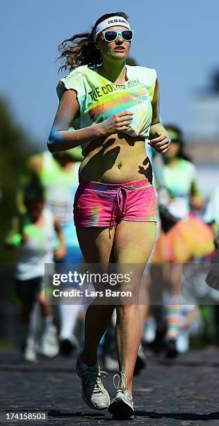 Competitors enjoy the Color Run on July 21, 2013 in Cologne, Germany.