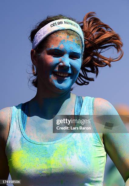 Competitors enjoy the Color Run on July 21, 2013 in Cologne, Germany.