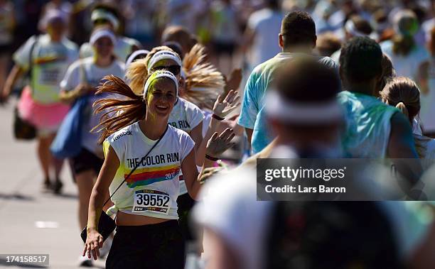 Competitors enjoy the Color Run on July 21, 2013 in Cologne, Germany.