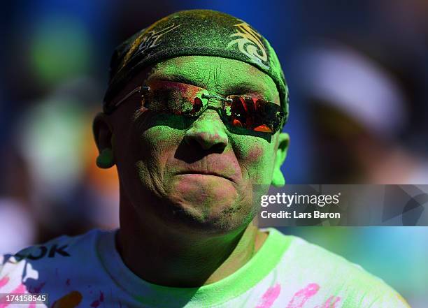 Competitors enjoy the Color Run on July 21, 2013 in Cologne, Germany.