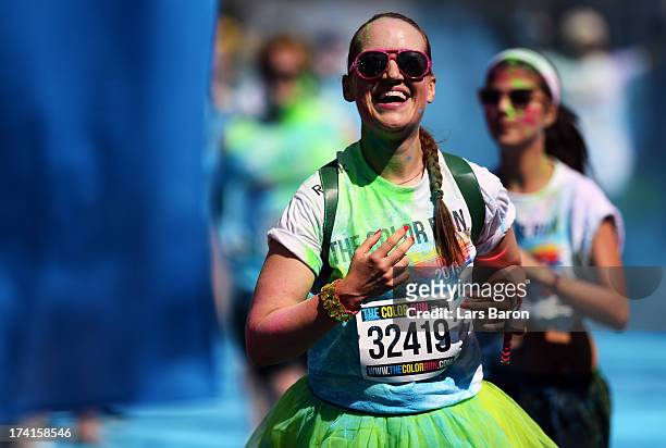 Competitors enjoy the Color Run on July 21, 2013 in Cologne, Germany.