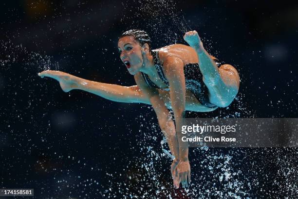 Carbonell Ballestero of Spain competes in the Synchronized Swimming Free Combination preliminary round on day two of the 15th FINA World...
