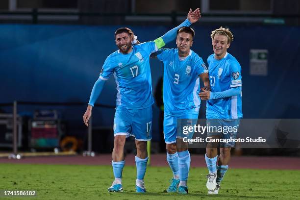 Golinucci Alessandro of San Marino celebrates after scoring his team's first goal with his teammates Tosi Alessandro and Lazzari Lorenzo during the...