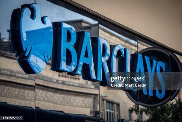 The sun shines on the Barclay's logo outside a branch of the bank Barclay's on October 18, 2023 in Bristol, England. Barclay's has confirmed that it...