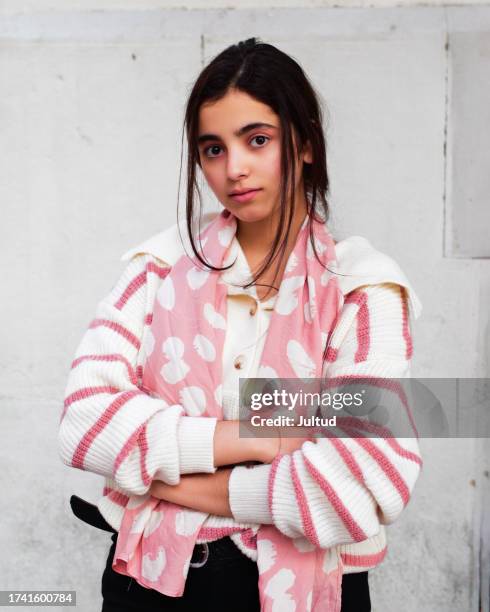 expressive portrait of a beautiful arab teenage girl, outdoors - sleeveless sweater stock pictures, royalty-free photos & images