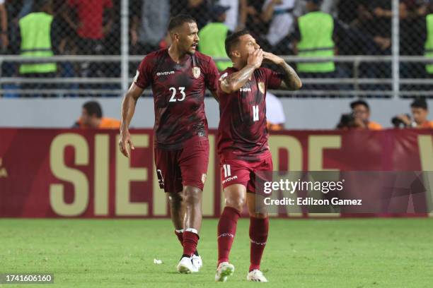 Darwin Machis of Venezuela celebrates with teammate Salomon Rondon after scoring the team's third goal during the FIFA World Cup 2026 Qualifier match...