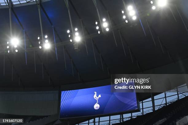 The big screen displays the Spurs cockerel ahead of the English Premier League football match between Tottenham Hotspur and Fulham at Tottenham...