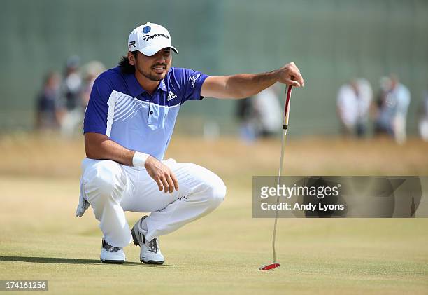 Jason Day of Australia lines up a putt on the 1st hole during the final round of the 142nd Open Championship at Muirfield on July 21, 2013 in...