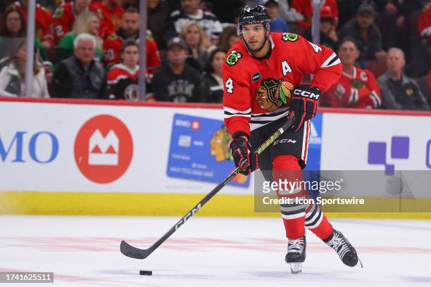 Chicago Blackhawks defenseman Seth Jones brings the puck up ice during a game between the Vegas Golden Knights and the Chicago Blackhawks on October...