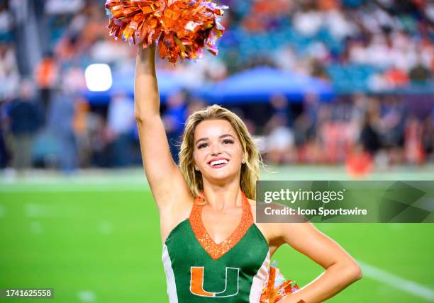 Miami cheerleader performs on the field before the start of the college football game between the Clemson Tigers and the University of Miami...