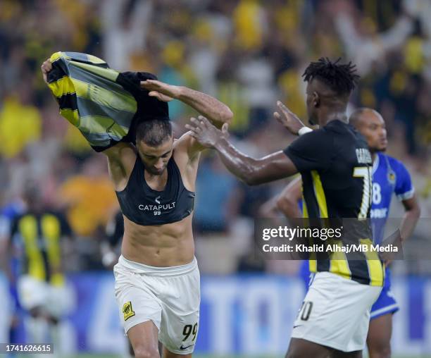 Abderrazak Hamdallah of Al-Ittihad celebrates by taking his shirt off after scoring his sides first goal during the AFC Champions League Group C...