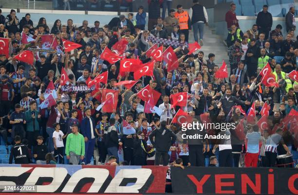 Supporters of Trabzonspor follow the Turkish Super Lig week 9 soccer match between Trabzonspor and Corendon Alanyaspor at Papara Park in Trabzon,...