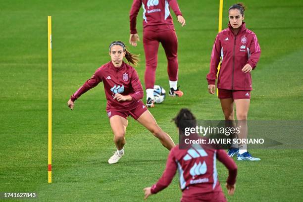 Spain's midfielder Aitana Bonmati attends a training session at the Ciudad del Futbol training facilities in Las Rozas de Madrid on October 23 as...