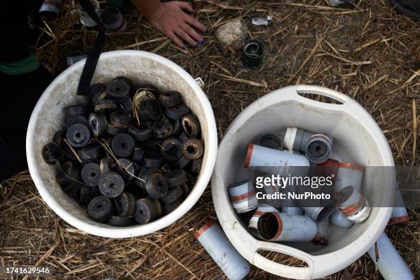 Protesters collect the remnants of tear gas canisters used against them by riot police. Protesters decided to create a ZAD in a farm 'La Cremade'...