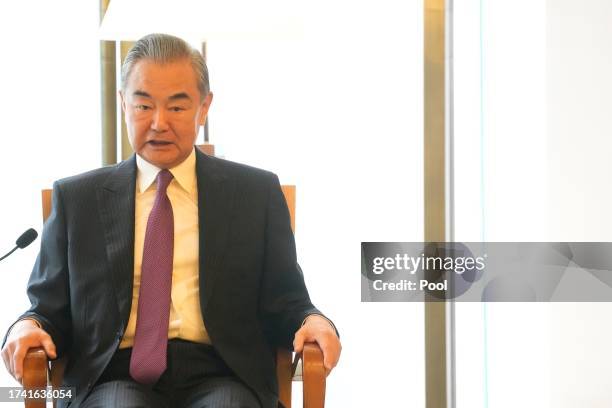 Chinese Foreign Minister Wang Yi speaks prior to an opening ceremony of a diplomatic symposium at the Diaoyutai State Guesthouse n October 24, 2023...