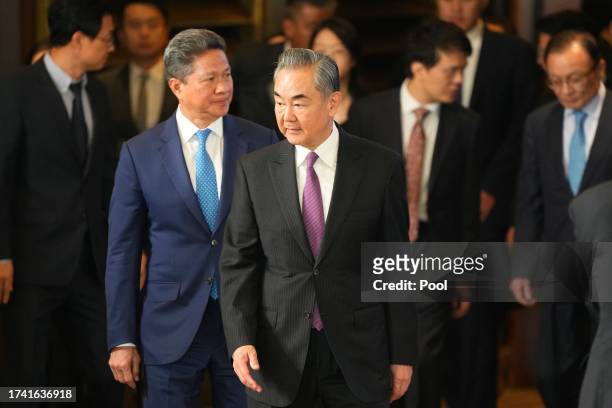 Chinese Foreign Minister Wang Yi arrives at an opening ceremony of a diplomatic symposium at the Diaoyutai State Guesthouse on October 24, 2023 in...