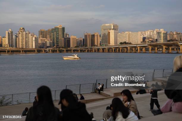 Boat sails along the Han River in Seoul, South Korea, on Sunday, Oct. 22, 2023. South Korea is scheduled to release its gross domestic product...
