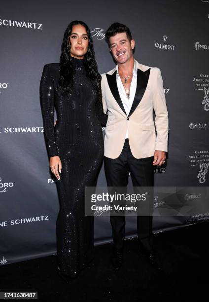 April Love Geary, Robin Thicke at the 25th Anniversary Angel Ball held at Cipriani Wall Street on October 23, 2023 in New York, New York.