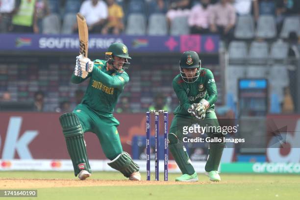 Quinton de Kock of South Africa plays a shot during the ICC Men's Cricket World Cup 2023 match between South Africa and Bangladesh at Wankhede...