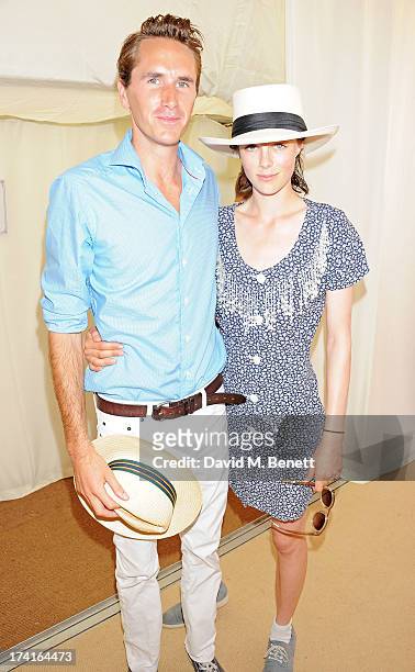 Otis Ferry and Edie Campbell attend the Veuve Clicquot Gold Cup Final at Cowdray Park Polo Club on July 21, 2013 in Midhurst, England.
