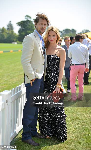 James Rousseau and Annabelle Wallis attend the Veuve Clicquot Gold Cup final at Cowdray Park Polo Club on July 21, 2013 in Midhurst, England.